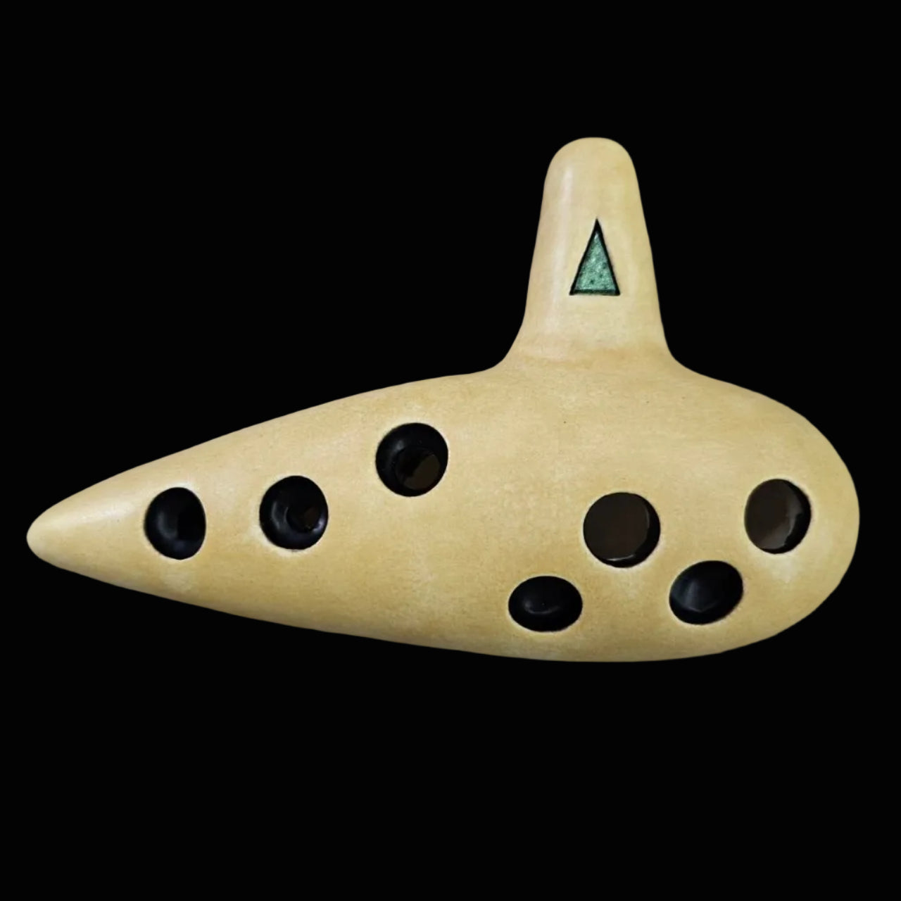 fairy ocarina given by Saria to Link in Kokiri Forest -- set with an emerald crystal and using a 7-hole fingering pattern